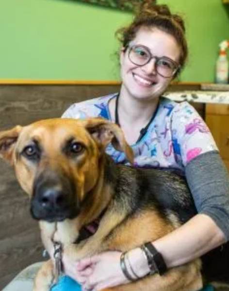 Katie Katie holding a pet