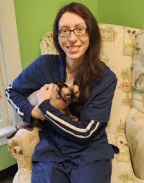 Lauren Lauren holding pet