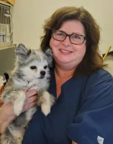 Martha Martha holding pet